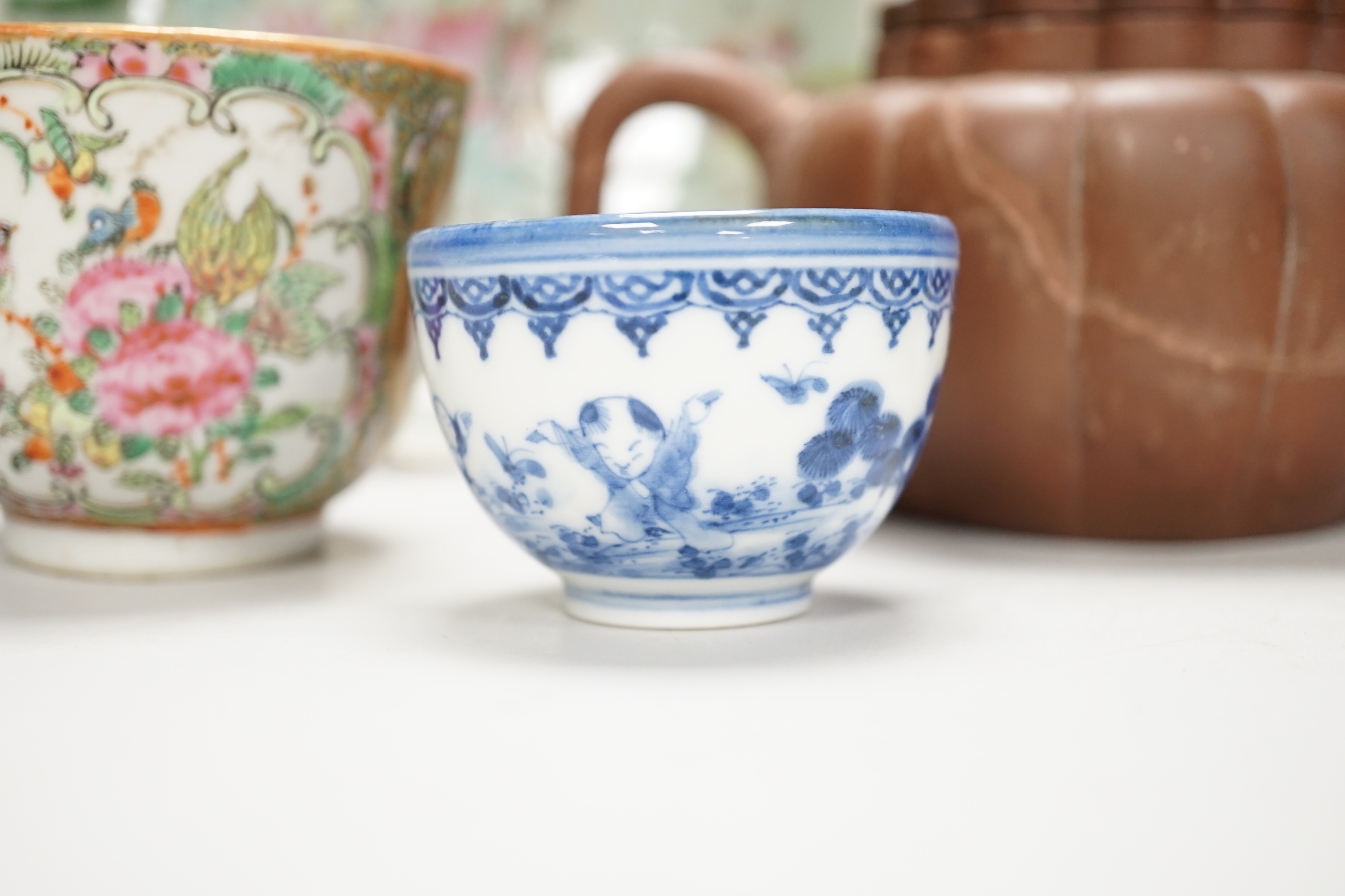 Chinese and Japanese ceramics, including Canton cups and blue and white teabowl, seven various Chinese famille rose dishes, 19th century, a Chinese Yixing teapot and a bronze censer